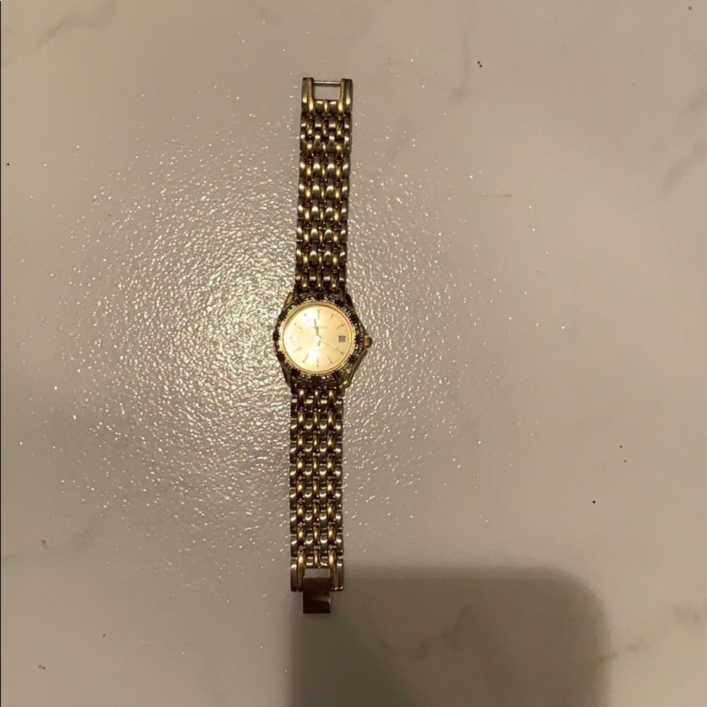 Neiman Marcus quartz date watch